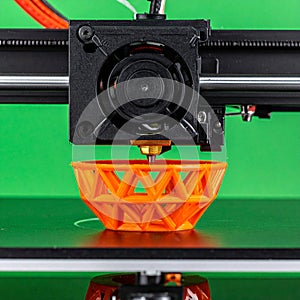 Modern 3D Printing Technology Creating an Orange Model