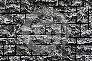 Modern dark brick wall. Pattern of decorative stone wall background. Surface black wall texture