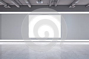 Modern grunge concrete exhibition hall interior with blank white mock up frame on wall. 3D Rendering