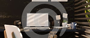 Modern dark office interior design with laptop computer mockup