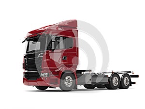 Modern dark red heavy transport truck without a trailer