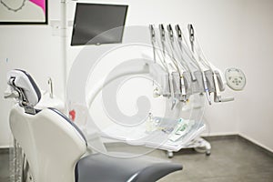 Modern dental clinic cabinet - dentist chair, equipment and tools. Dentistry, medical office