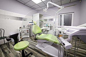 Modern dentistry office interior with chair and tools - medicine