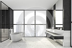 Modern design bathroom interior with shower cabin, white oval bathtub, double sink countertop, silver faucets. Panoramic window