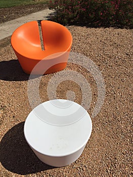 Modern design chair and table in a park