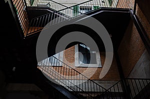 Modern design metal staircase with brick building