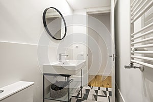 Modern design shower toilet in white, black and gray colors with round mirror