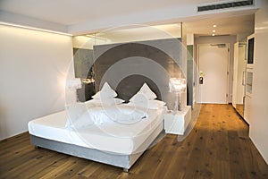 Modern designed bedroom in a Hotel in South Tyrol photo