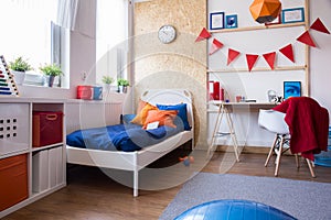 Modern designed teen boy bedroom photo