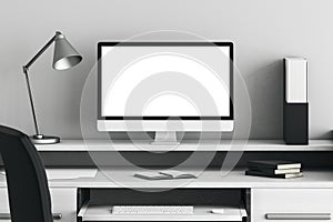 Modern desktop with white laptop