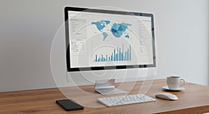 Modern Desktop Computer Displaying Data Analytics in Bright Office Setting