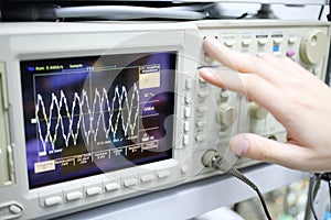 Modern device oscilloscope with photo