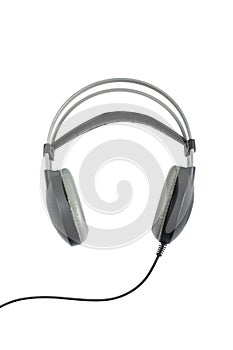 Modern device. Wireless black headphones front view isolated on white background