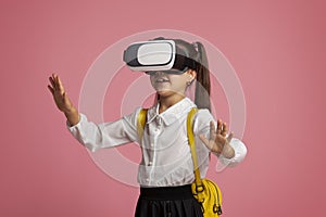 Modern devices for education. Virtual world with glasses and school girl