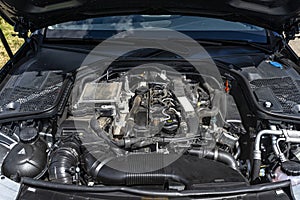 A modern diesel engine with 170 horsepower and an engine capacity of 2.2 liters. Visible engine equipment, spark plugs and electri