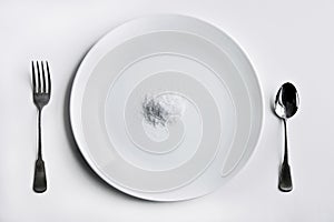 Modern Diet Concept with Plate and White Powder