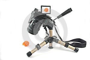Modern digital camera on a mini tripod