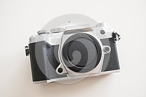 Modern digital camera with a vintage look, front view