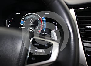 Modern digital screen panel of a car with indications of technical parameters