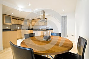 Modern dining area with kitchen