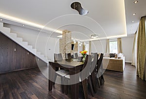 Modern dining area between the living room and kitchen. photo