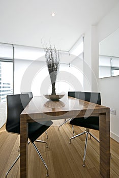 Modern dining area with wooden table