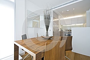 Modern dining area with wooden table