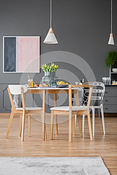 Modern dining chairs around table