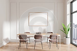 Modern dining room with a blank framed poster on the wall, wooden table, chairs, and a plant, on a city background, mockup concept