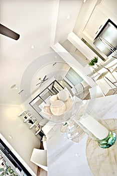 Modern dining table interior with white walls in the kitchen