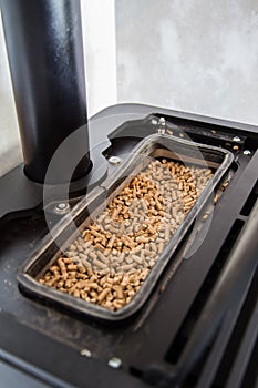 Modern domestic pellet stove photo