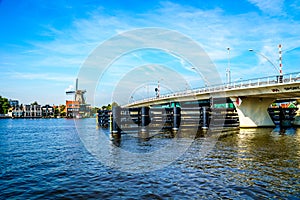 Modern Draw Bridge at the town of Zaandijk crossing the Zaan River photo