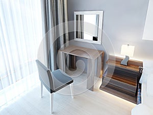 Modern dressing table with chair and mirror.