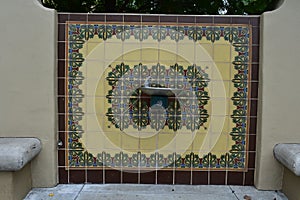 A modern drinking fountain and tile mosaic in Carpinteria, California.