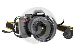 Modern DSLR camera over white