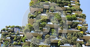 Modern and ecologic skyscrapers with many trees on every balcony, Milan, Italy