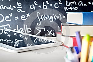 Modern education and e learning tools in school classroom table.