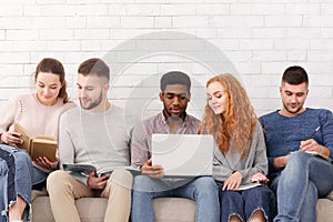 Modern education. Students with laptop and notepads