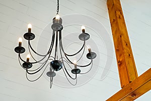 Modern electric ceiling lamp designed as old style chandelier