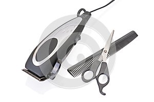 Modern electric hair / beard trimmer with scissors and comb