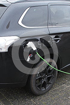 Modern electric plug car charges new electric energy, Netherlands