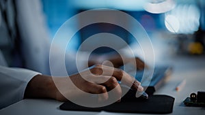 Modern Electronics Research, Development Facility: Engineer Working on Computer, Using Computer