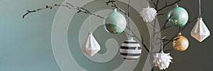 Modern and elegant simple nordic christmas tree decorations in black, white, gold and turquoise