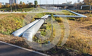 Modern Elevated Heat Pipes. Pipeline above ground, conducting he