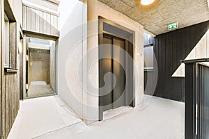Modern elevator in apartment building hall