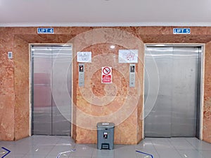 Modern Elevators in a Public Building Lobby