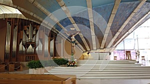 Modern empty church with jesus crist on the cross of San Giovanni Rotondo in Apulia - Italy