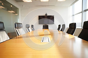 Modern empty conference room with large table and chairs