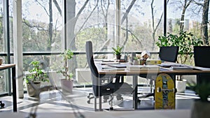 Modern empty light office interior with panorama window background. Working area