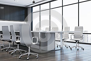 Modern empty meeting room interior with office table and chairs, window and wooden floor. 3D Rendering